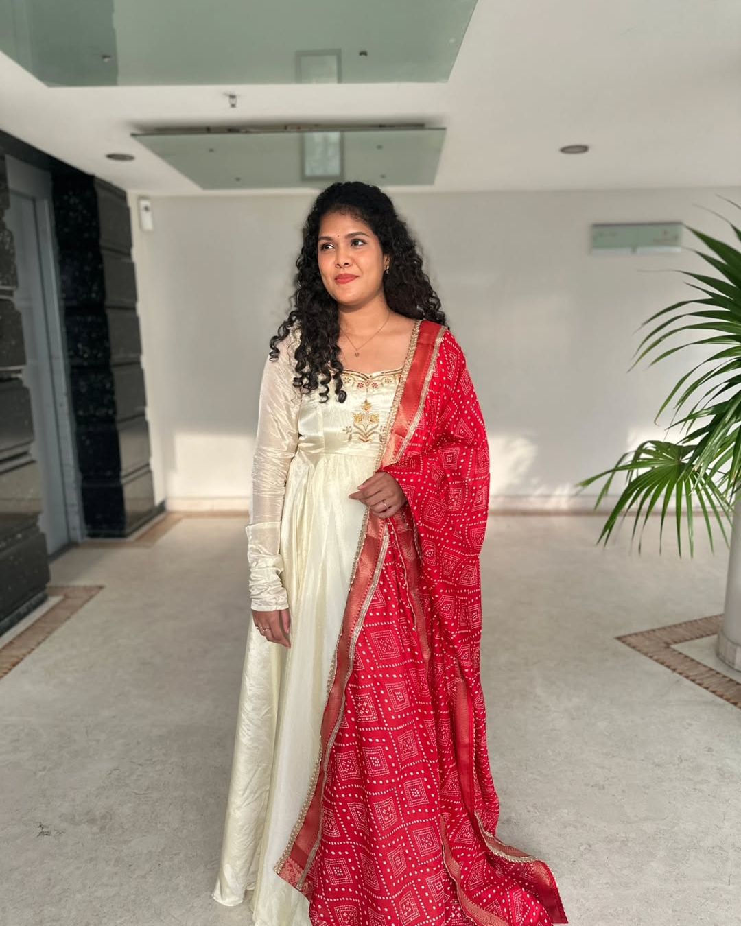 Monica-Ivory and red floor length gown | Petals Chennai