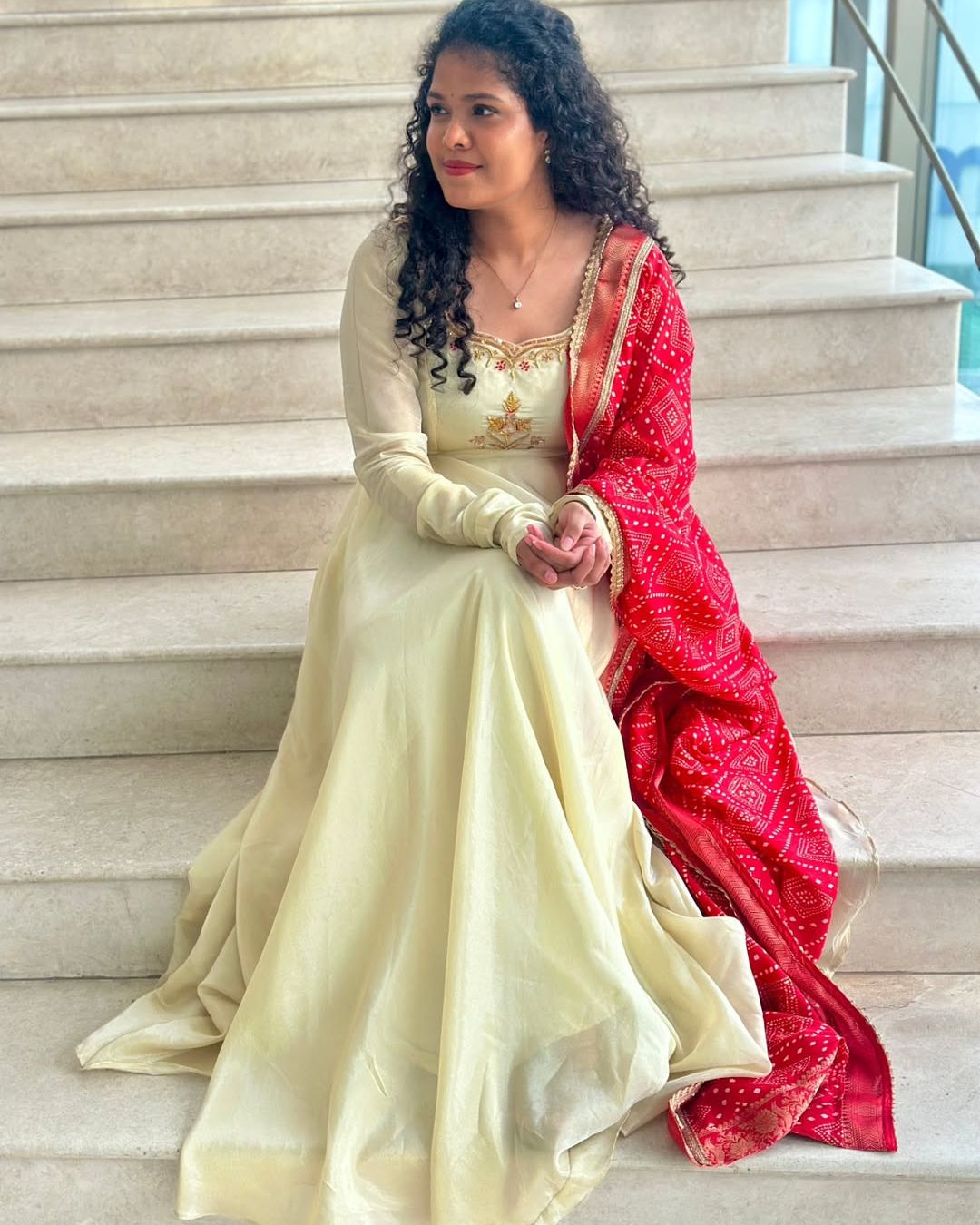 Monica-Ivory and red floor length gown | Petals Chennai