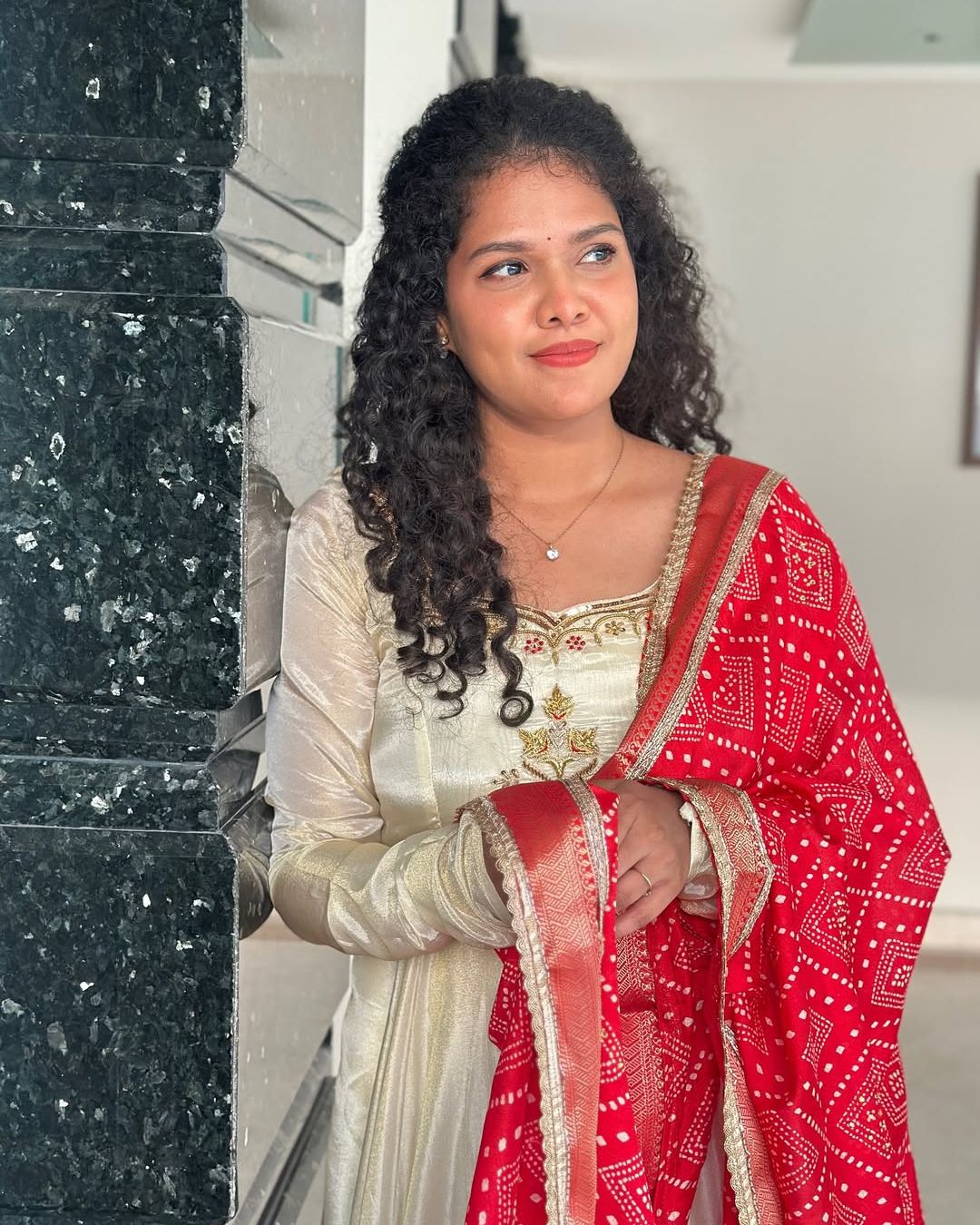 Monica-Ivory and red floor length gown | Petals Chennai