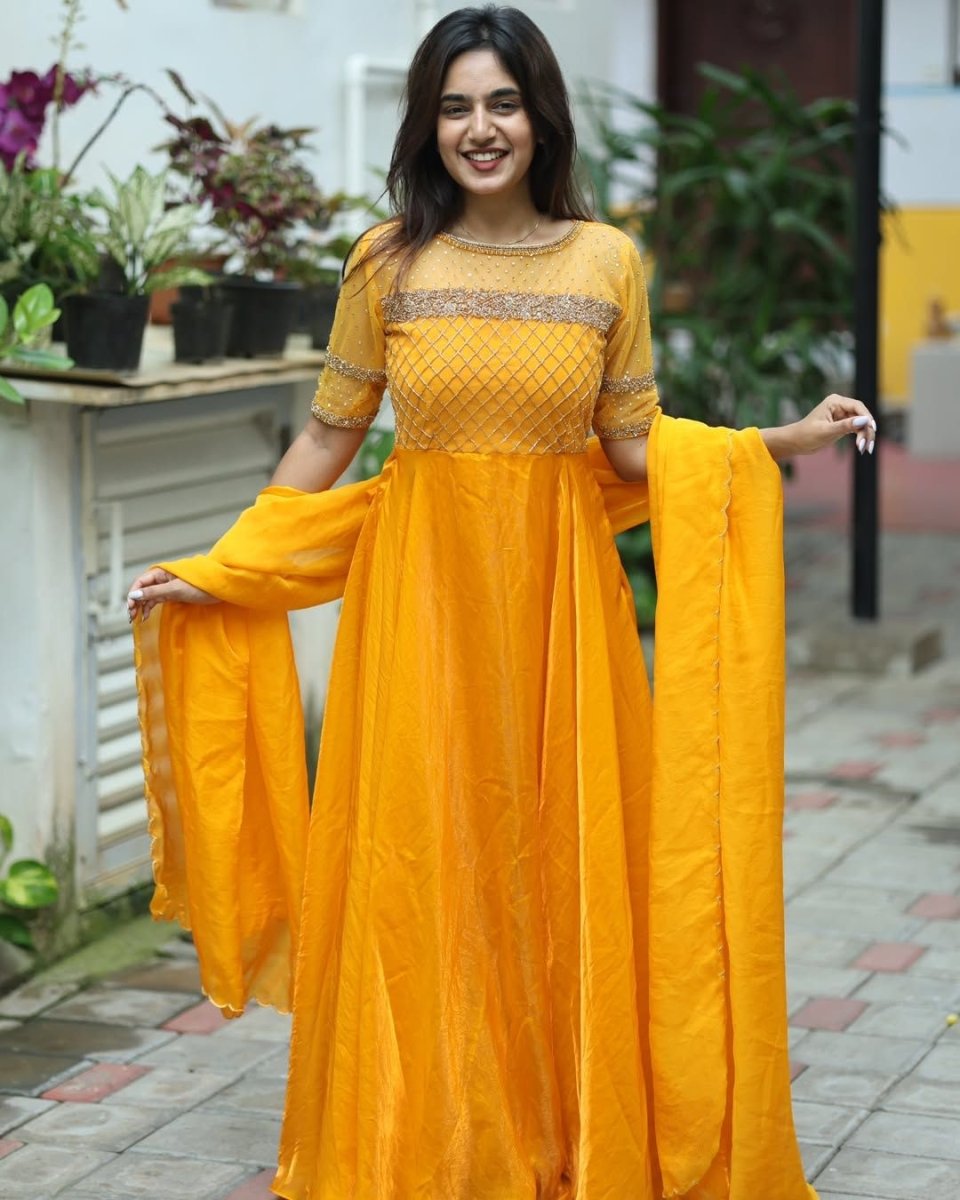 Sakshi - Mustard yellow floor length gown and duppata | Petals Chennai - Petals Chennai
